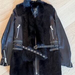 Nour Hammour leather jacket with fur accents and studs